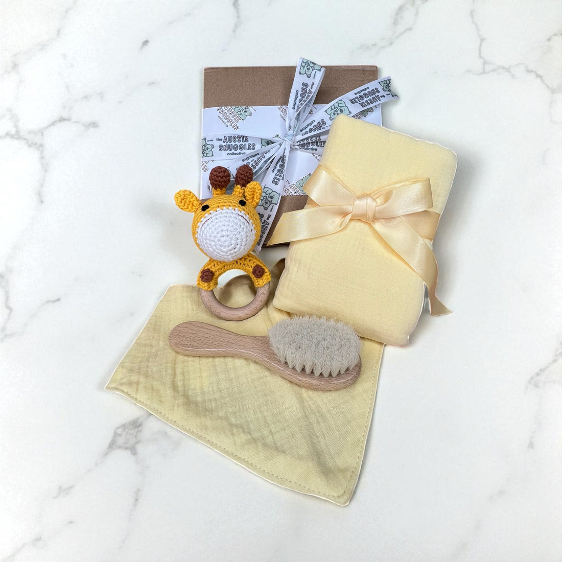 Aussie Snuggles Tiny treasure- Crochet toy, muslin swaddle, bib, hairbrush, hello world
